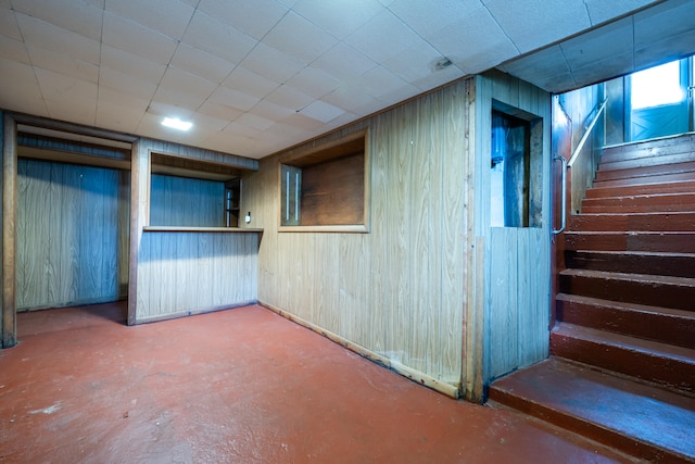 basement with wooden walls