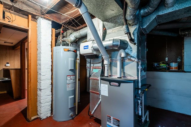 utility room featuring water heater