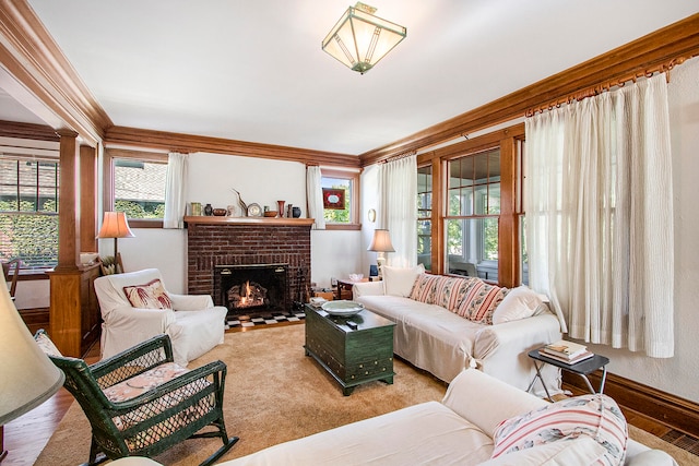 living room featuring a fireplace, crown molding, and hardwood / wood-style floors