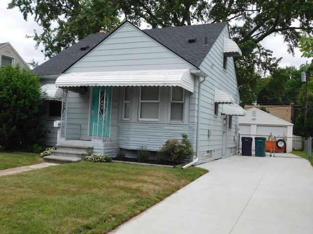 bungalow-style home featuring a front lawn