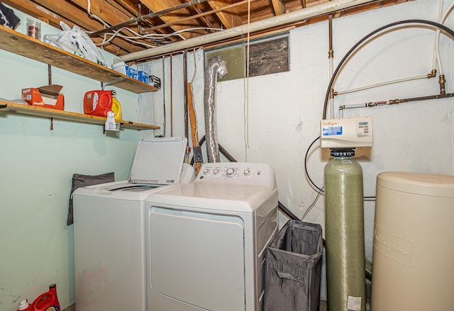 washroom featuring washer and dryer