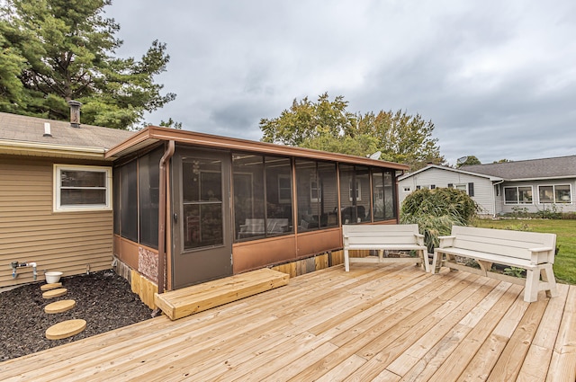 deck with a sunroom