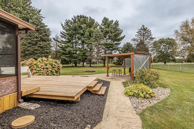 exterior space with an outdoor structure, a gazebo, and a lawn