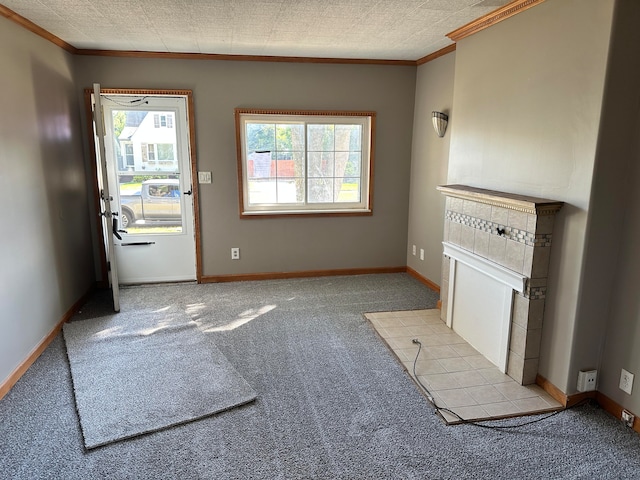 unfurnished living room with a textured ceiling, light colored carpet, and crown molding