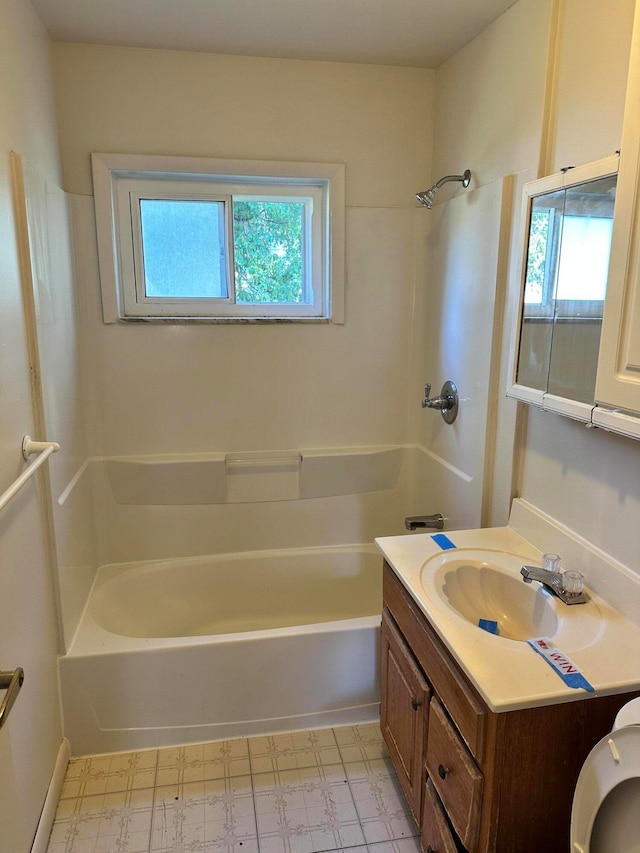 full bathroom featuring vanity, plenty of natural light, and shower / bath combination