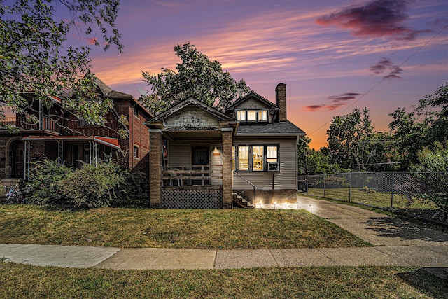 view of front of house with a lawn