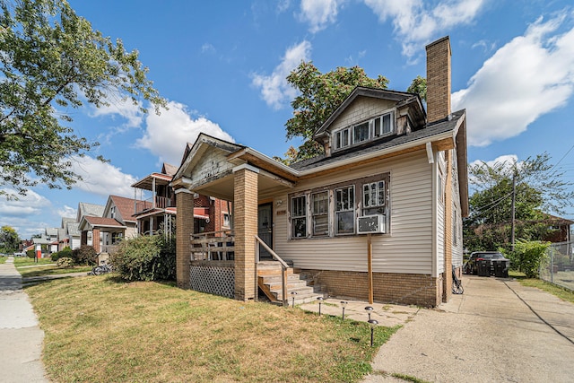 view of front of home with a front yard