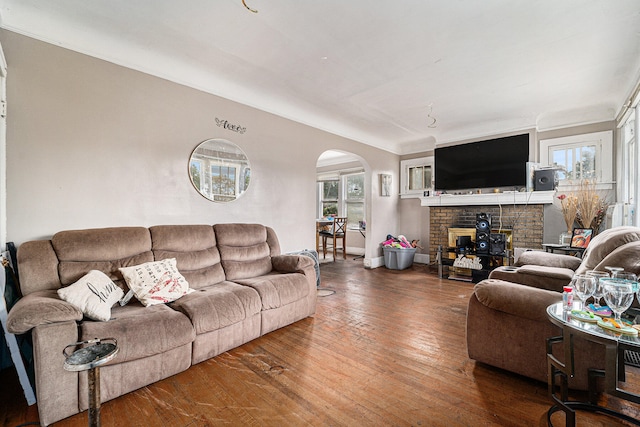 living room featuring a fireplace and hardwood / wood-style floors