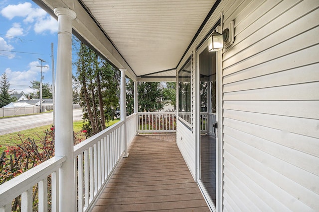 3143 US 31 N, Conway, MI 49722 - deck featuring a porch