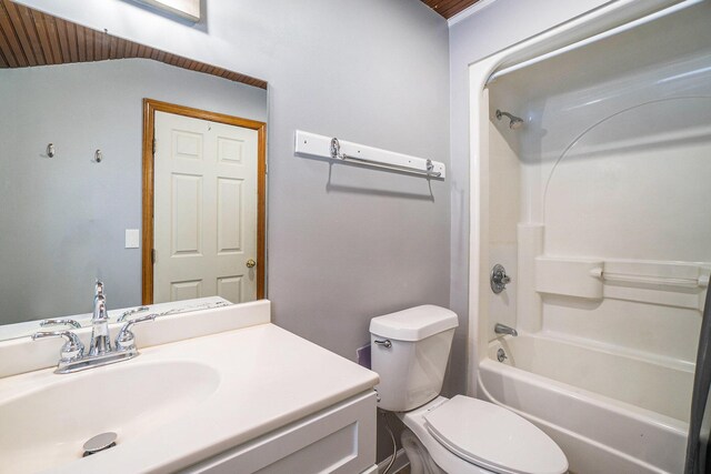 3143 US 31 N, Conway, MI 49722 - bathroom featuring toilet, vanity, and bathing tub / shower combination