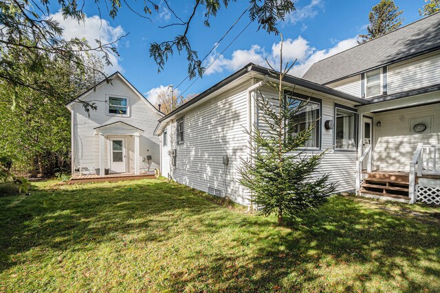 3143 US 31 N, Conway, MI 49722 - view of side of property with a yard