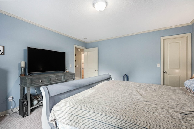 bedroom with carpet floors, a textured ceiling, and ornamental molding