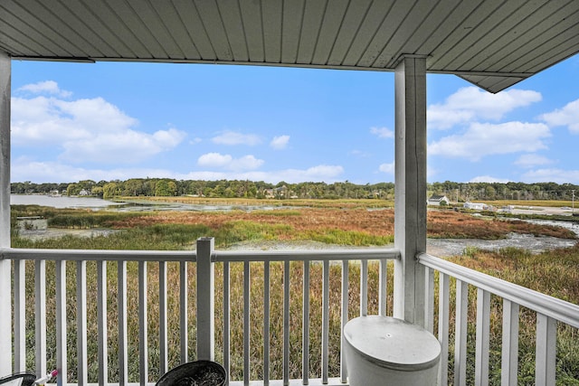 balcony featuring a water view