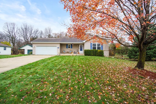 ranch-style house with a garage and a front yard