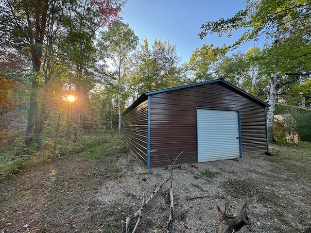 view of outbuilding with a garage