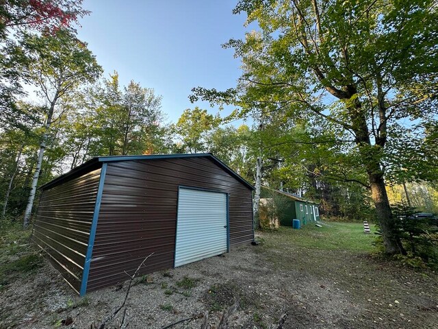 view of outdoor structure with a garage