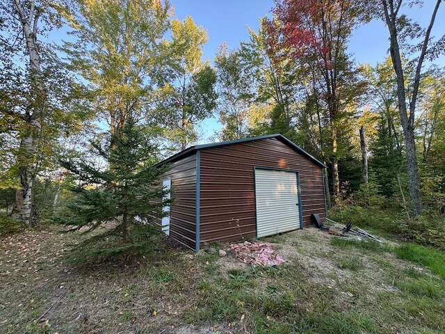 view of outdoor structure featuring a garage