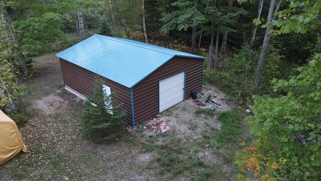 view of outbuilding featuring a garage