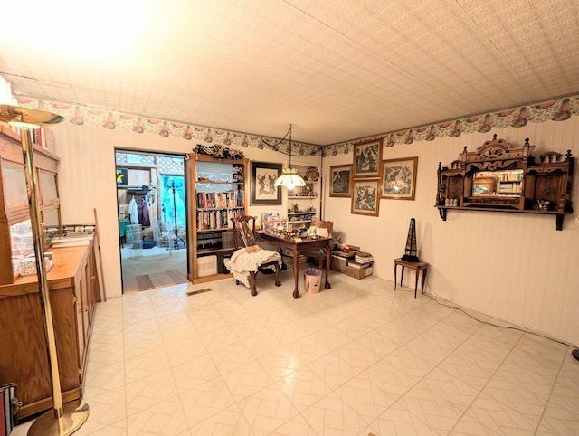 dining area with light tile patterned floors