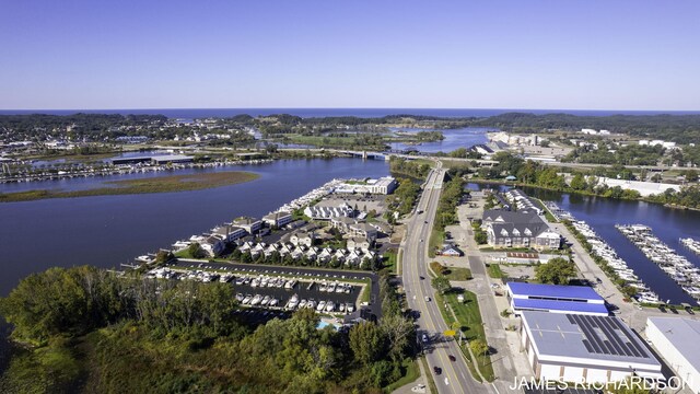 birds eye view of property featuring a water view