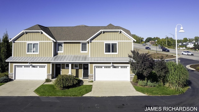 view of front of property featuring a garage