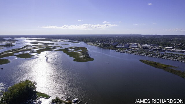 drone / aerial view featuring a water view