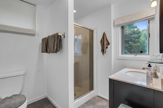 125 Westshore Dr, Jerome, MI 49249 - full bathroom featuring a shower stall, vanity, baseboards, and toilet