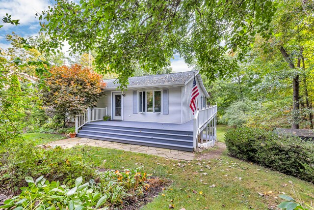 view of front of house featuring a deck