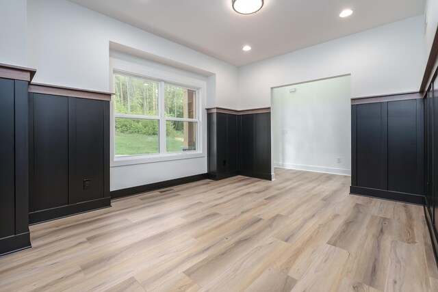 unfurnished bedroom with light hardwood / wood-style floors