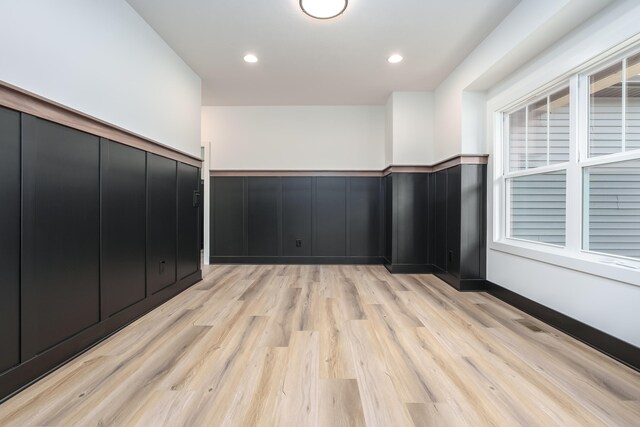 interior space with light hardwood / wood-style floors and plenty of natural light