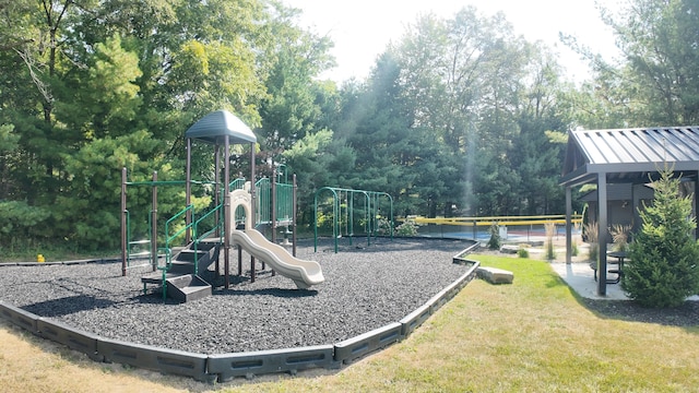 view of playground featuring a yard