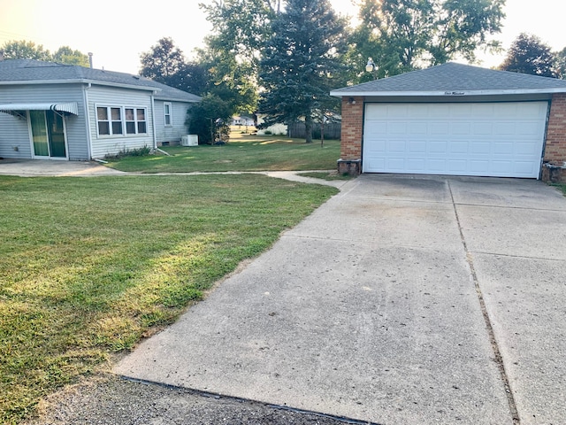 view of yard with a garage