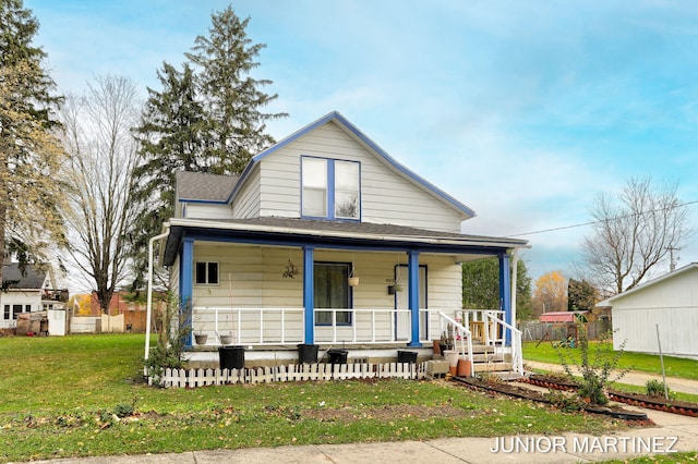 view of front of property with a front lawn and a porch