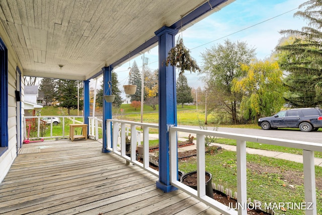 wooden terrace with covered porch