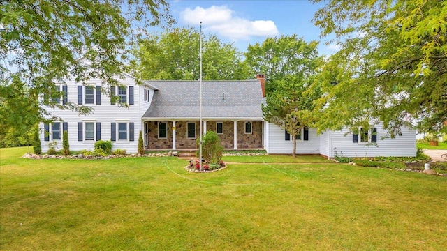 view of front of home with a front lawn