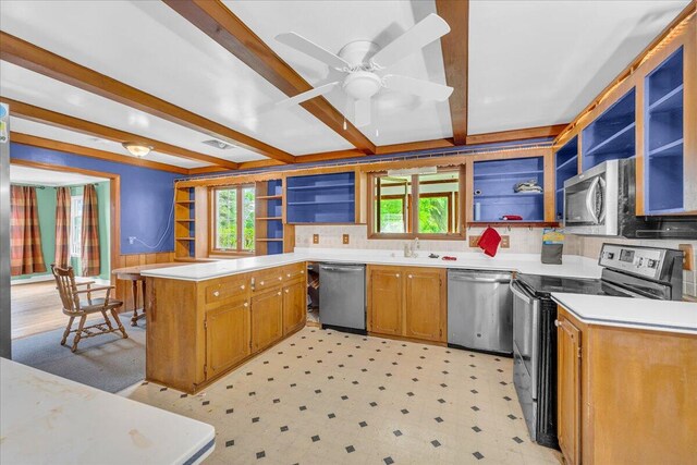 kitchen featuring beamed ceiling, sink, backsplash, appliances with stainless steel finishes, and ceiling fan