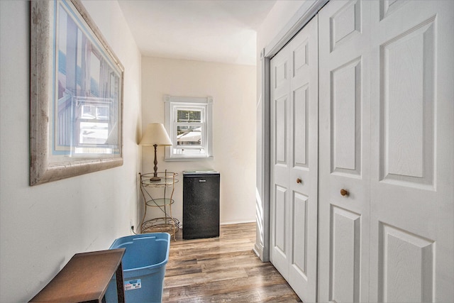 hallway featuring hardwood / wood-style floors