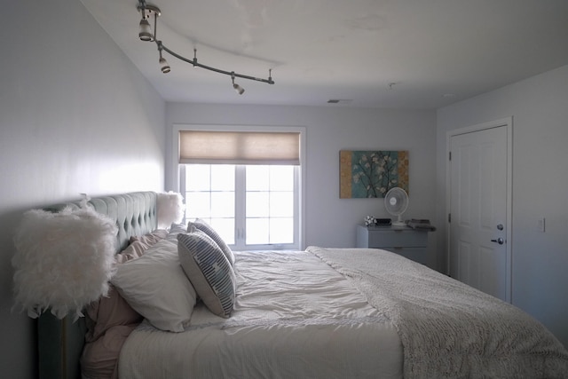 bedroom with rail lighting