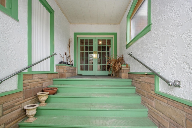 stairway featuring french doors