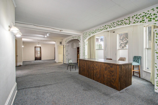 carpeted office space with ornamental molding