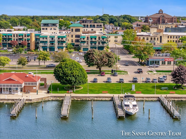 birds eye view of property featuring a water view