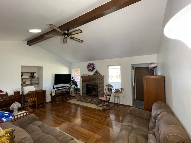 living room with ceiling fan, dark parquet flooring, a brick fireplace, and lofted ceiling with beams