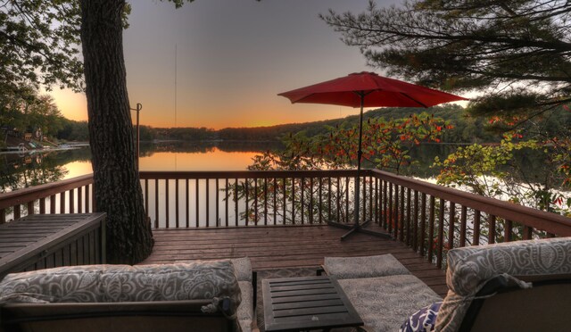 deck at dusk with a water view