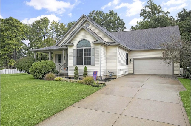 view of front facade featuring a front lawn, a porch, and a garage