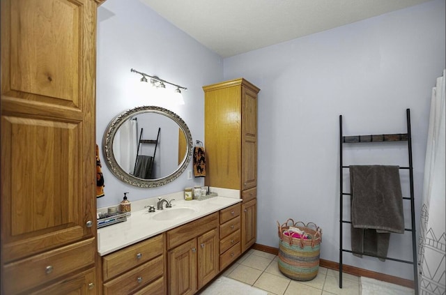 bathroom featuring vanity and tile patterned flooring