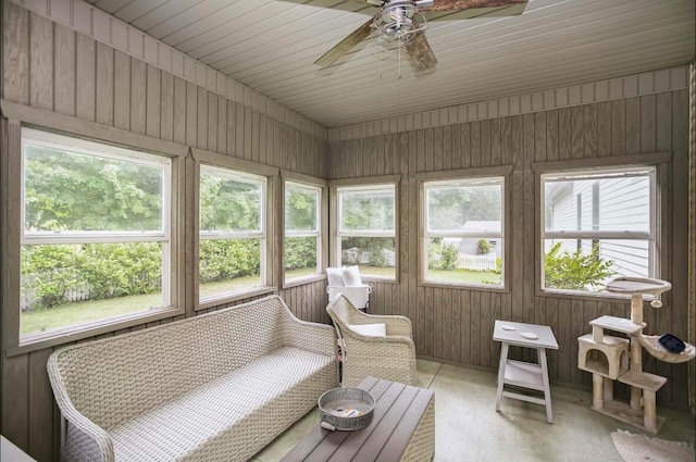 sunroom / solarium with ceiling fan and a wealth of natural light