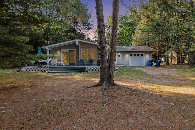 view of front of house with an outbuilding and a garage