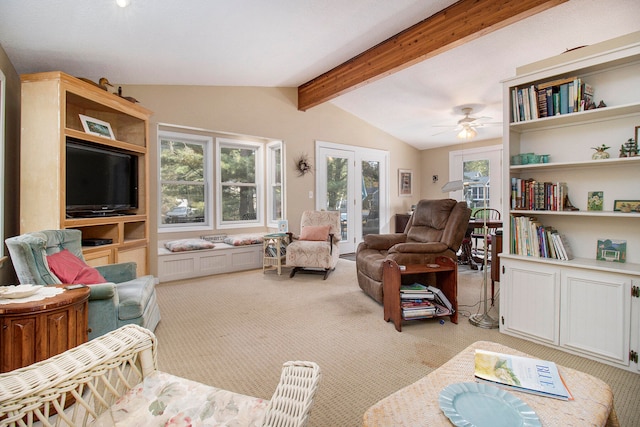 living room featuring light carpet, ceiling fan, and lofted ceiling with beams