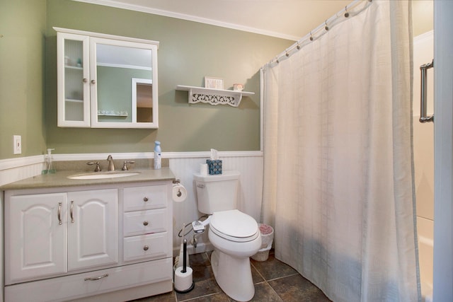 full bathroom featuring ornamental molding, shower / tub combo, vanity, and toilet