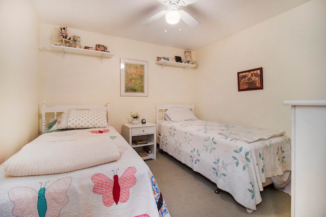 bedroom with ceiling fan and carpet